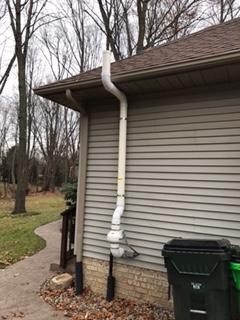 External Radon Mitigation System on House in Berea, OH