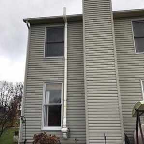 External Radon Mitigation System Installed on House