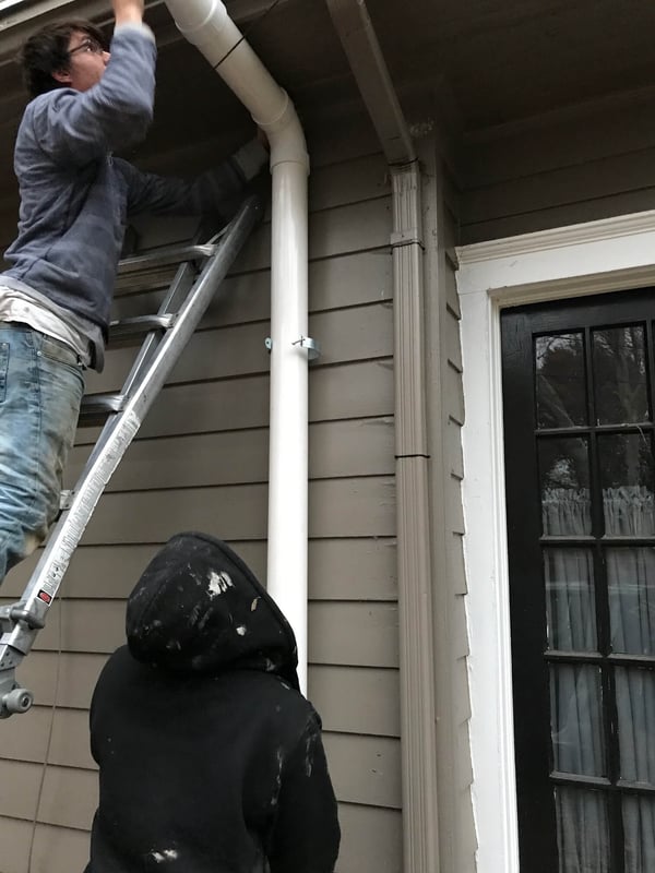Technicians Installing a Radon Mitigation System in Vermilion